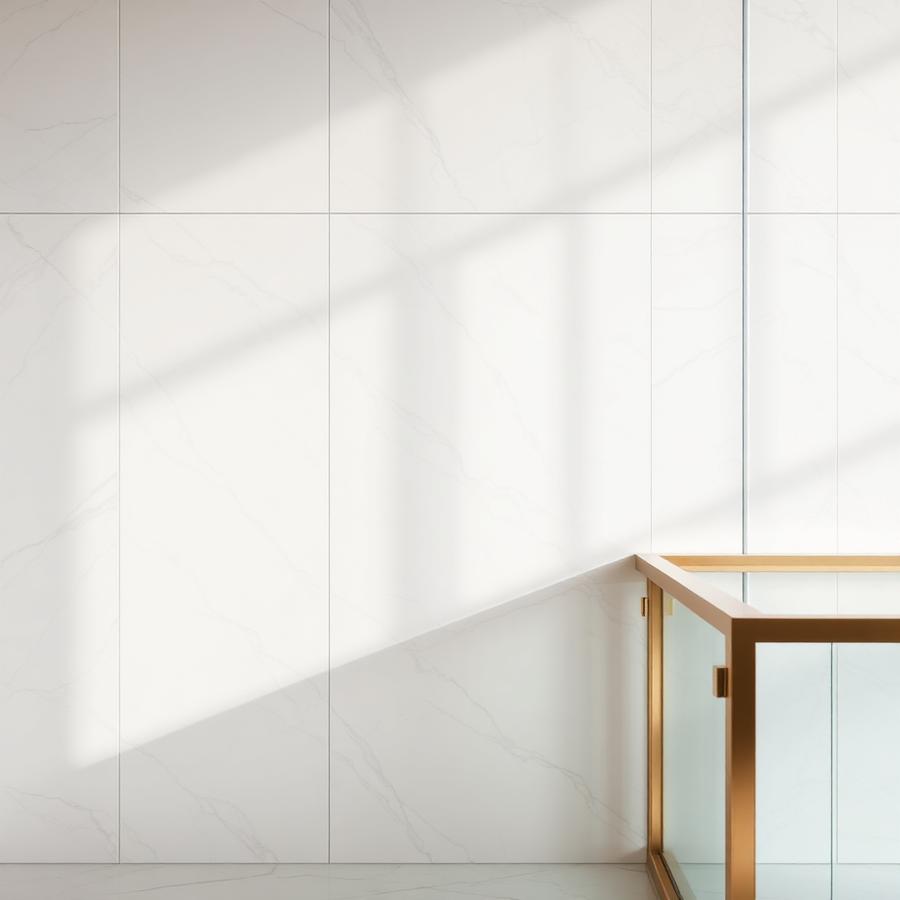Book-matched marble interior detail with brass accents